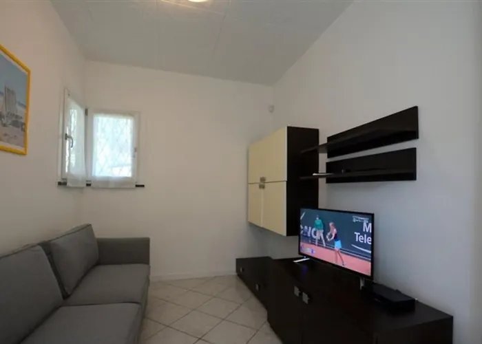 Semi Detached With Private Fenced Garden In Lignano Pineta Villa *