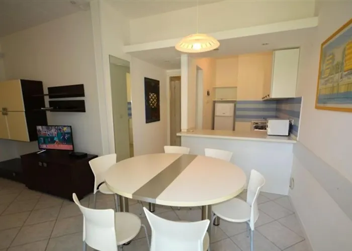 Semi Detached With Private Fenced Garden In Lignano Pineta Villa *