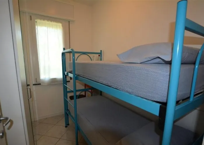 Villa Semi Detached With Private Fenced Garden In Lignano Pineta