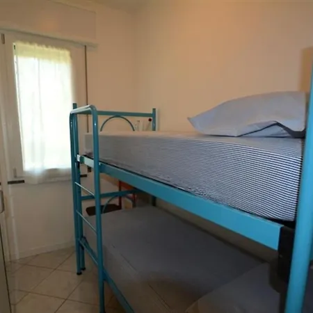 Villa Semi Detached With Private Fenced Garden In Lignano Pineta