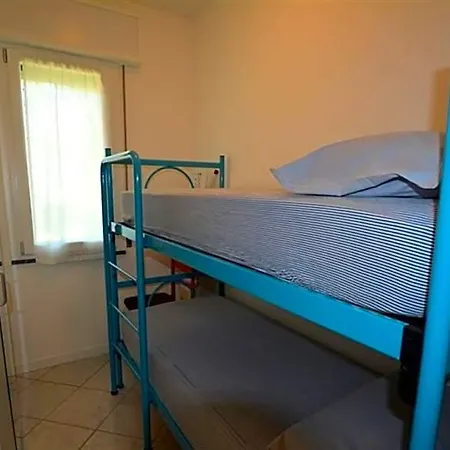 Semi Detached With Private Fenced Garden In Lignano Pineta *